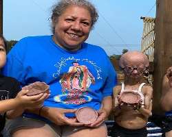 She loves to do pottery with her grandma and brothers.